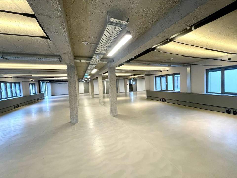 Urbanes Arbeiten im Industrial-Chic: Großzügige Open-Space Bürofläche in Top-Lage nahe Rochusmarkt