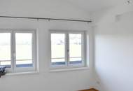 Sonnige 4 Zi-Dachgeschosswohnung mit Terrasse und Balkon!