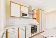 Eigentumswohnung in Top Lage mit Garage und Eigengarten!