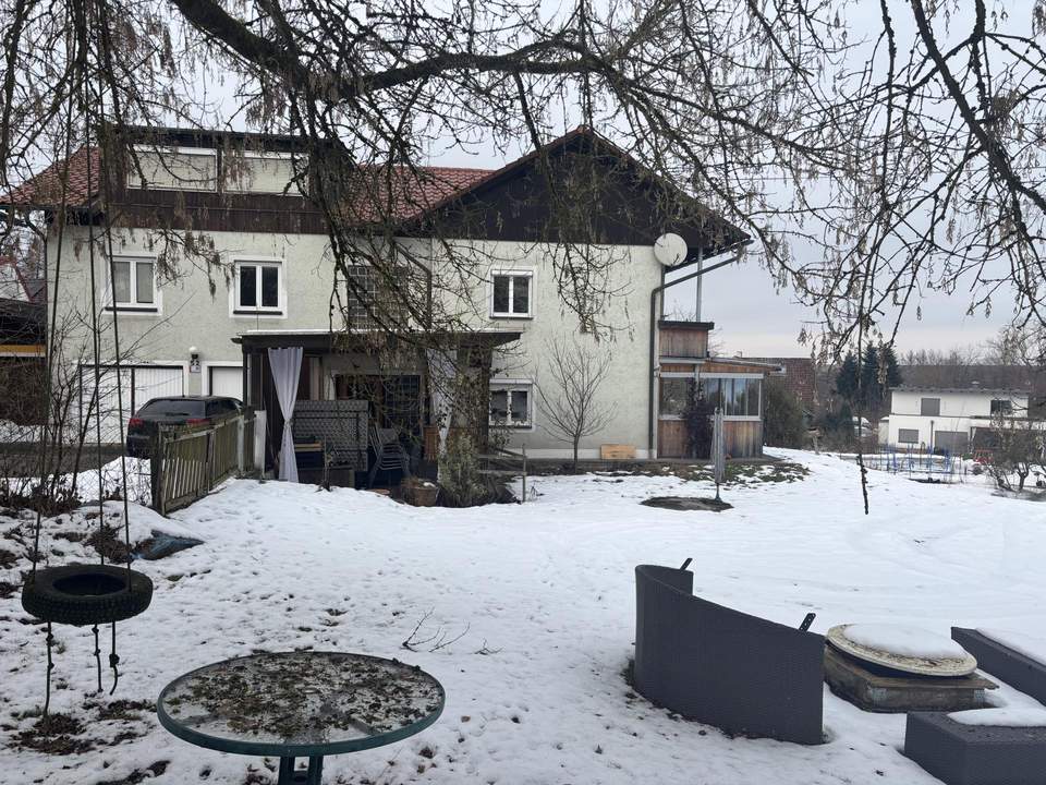 Mehrfamilienhaus mit kompaktem Garten