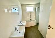 ERSTBEZUG! Geräumige Eigentumswohnung im Obergeschoss mit Balkon und größer Dachterrasse