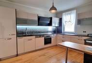 GEPFLEGTE NEUBAUWOHNUNG MIT BALKON IM ZENTRUM