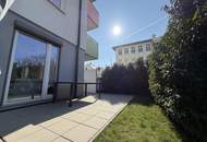 Moderne & zentrale 2-Zimmer-Eigentumswohnung mit Garten und Tiefgaragenplatz