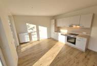 Geförderte Neubauwohnung mit Terrasse im 1. Stock