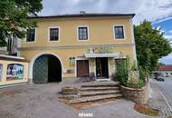 Vielseitige Immobilie mit Pizzeria und Wohnmöglichkeiten