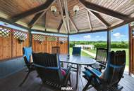 High-end living in a peaceful green location! A feel-good retreat in a class of its own: tradition meets state-of-the-art comfort!