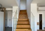 Dachgeschossmaisonette mit einer Traumterrasse und vollmöblierter Küche