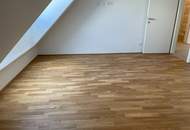 Moderne 2-Zimmer-Dachgeschosswohnung mit Komplettküche, Balkon und Kellerabteil / ALF52 3-15