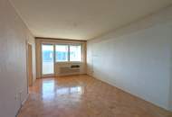 Sanierungsbedürftige 3-Zimmer-Eigentumswohnung mit Balkon, Loggia und Garage