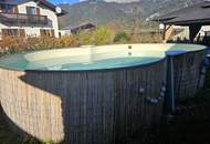 Großzügiges Zweifamilienhaus mit Garten und Pool