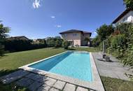 Tolles Zweifamilienhaus mit Einliegerwohnung, sonniger Terrasse, Keller, Doppelgarage und Pool!