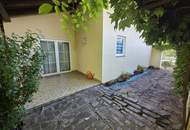 Bungalow mit Garage und großem Garten in Badener Grünruhelage!
