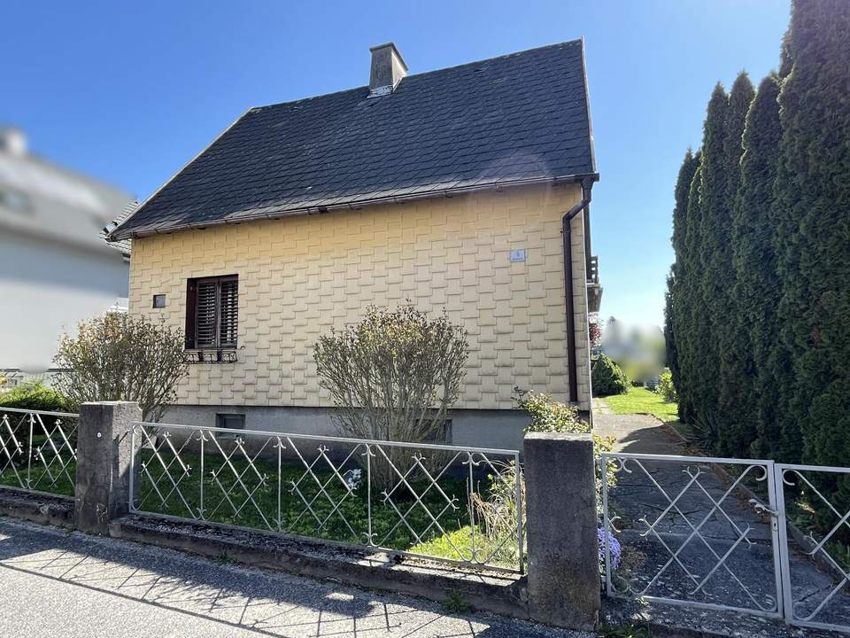 Einfamilienhaus in Wohnlage - neue Eigentümer gesucht!