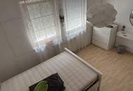 Einfamilienhaus mit Garage &amp; Wintergarten in Ortsrandlage