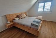 Sonnige, neue 3 Zi-DG-Wohnung mit Terrasse und TG-Platz