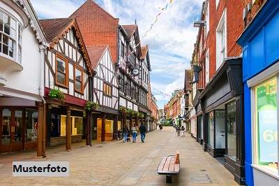 Historisches Wohn- und Geschäftshaus mit modernem Neubautrakt und Dachterrasse