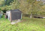 Sanierungsbedürftiger Bungalow mit großem Grundstück - in ruhiger, sonniger Lage