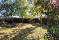 Gartenwohnung mit Reihenhaus-Charakter inklusive Doppelcarport – ruhig & zentral