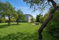 Sonniges Baugrundstück in ruhiger Siedlungslage mit Mehrfamilienhaus
