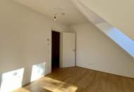 "3 Zimmer Dachgeschosswohnung mit zwei Balkone und Garage"