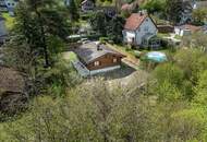 „Wohnen im Einklang mit der Natur – Stilvolles Holzhaus in traumhafter Ruhelage auf unverbaubarem Grundstück“