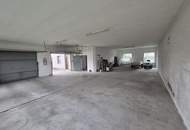 Mehrfamilienhaus mit Geschäftslokal