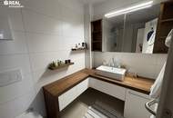 Neuwertige 2-Zimmer-Eigentumswohnung mit Kamin, Loggia und Garage