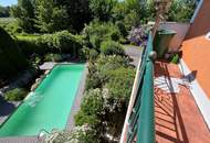 Charmantes Zweifamilienhaus mit idyllischem Naturpool