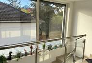 FAMILIENDOMIZIL MIT GARTEN UND GARAGE