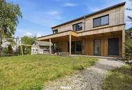Neuwertiges Einfamilienhaus mit überdachter Terrasse und großzügiger Garage