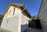 Einfamilienhaus Hohenems, Nahe Zentrum, großzügige Terrassenfläche mit Gartenanlage, neuer Zaun mit Sichtschutz, mehrere Außenstellplätze auf privatem Grundstück.