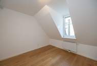 Dachgeschoßwohnung mit eingeschnittener Terrasse, vier Schlafzimmern und schönem Fernblick