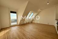 2 Monat Mietzinsfrei: 60m² Dachgeschosswohnung mit Kühlung & Blick über die Felder