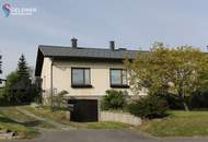 Solides Einfamilienhaus mit 3 Zimmer, Terrasse, großer Garten und 2 Garagen und Nebengebäude