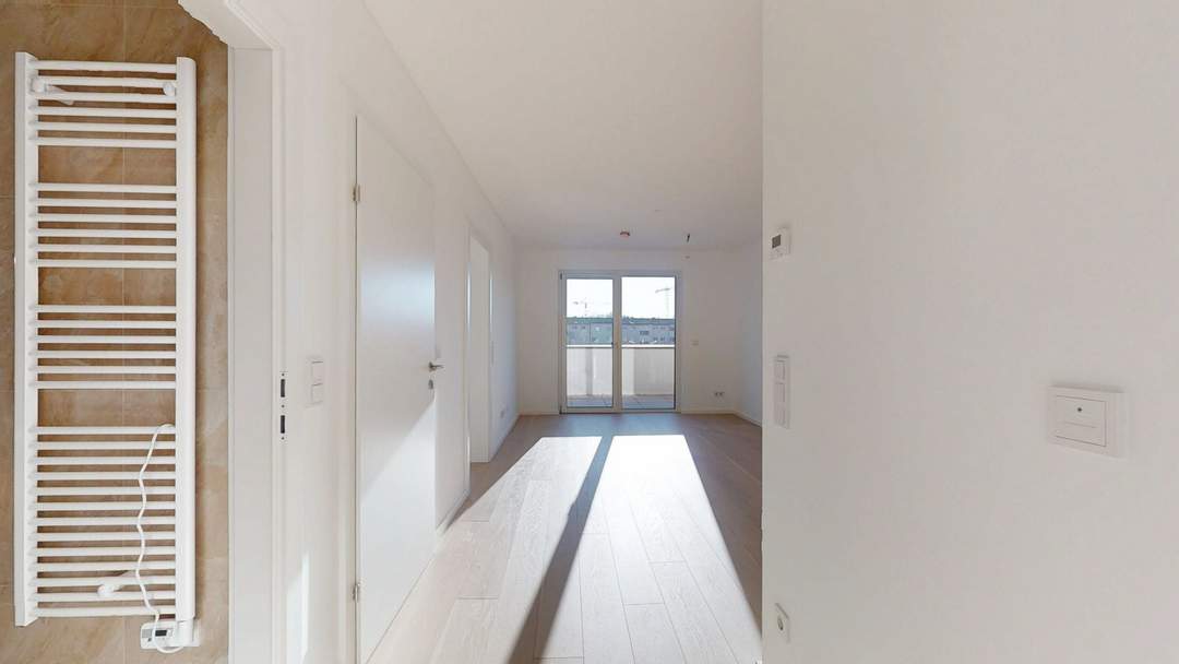 2-Zimmer-Erstbezug mit Innenhof-Balkon – Anleger oder Eigennutzer