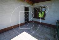 Sanierungsbedürftiges Einfamilienhaus mit Fernsicht in Grünruhelage!