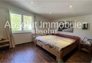 Attraktives Mehrfamilienhaus mit 2 Einheiten in sonniger Lage, großem Garten, Carport, PV-Anlage uvm