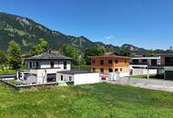 Raum für Träume – Baugrundstück mit Weitblick in Lechaschau zum Kaufen!