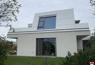 Moderne lichtdurchflutete Traumvilla in bester Lage am See