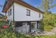 Charmantes Einfamilienhaus mit Terrasse, Garage und Kamin in Götzendorf, sanierungsbedürftig