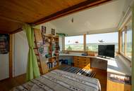 Nachhaltig wohnen mit Erdwärme – Architektenhaus in idyllischer Grünruhelage mit Weitblick