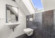 Wohnen über den Dächern von Graz mit Blick auf den Schlossberg: Exklusive Stadtwohnung mit Terrasse