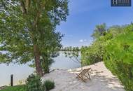 An Exceptional Waterfront Retreat with Private Beach and Unrivaled Privacy