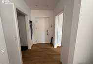 Neuwertige 2-Zimmer-Eigentumswohnung mit Kamin, Loggia und Garage