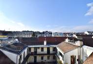 Weitblick, Ruhe & zentrale Lage – Sonnige Altbauwohnung mit Balkon