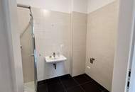 1,5-Zimmer Wohnung mit Gartenterrasse in generalsaniertem Neubau mit 11m2 Terrasse und einer tollen Raumhöhe!