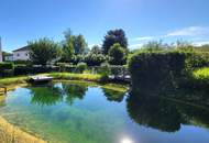 Exquisites Wohnen mit großzügiger Sonnen-Terrasse und Schwimmbiotop
