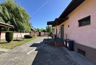 Bungalow mit (Feuchtigkeitsschäden) Garage und Nebengebäude zu verkaufen