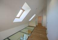 Dachgeschoßwohnung mit eingeschnittener Terrasse, vier Schlafzimmern und schönem Fernblick