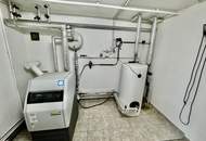 GROßZÜGIGES ZWEIFAMILIENHAUS MIT 1.548 m² TRAUMGARTEN IN ZENTRALER GRÜNLAGE